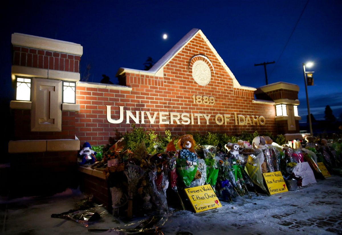 <i>Lindsey Wasson/Reuters</i><br/>Letters from surviving roommates were read at a church memorial service for slain University of Idaho students on Friday. Pictured is  makeshift memorial for the four students at the University of Idaho campus sign.