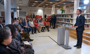 Dutch Prime Minister Mark Rutte (right) apologized on behalf of his government for the Netherlands' historical role in slavery and the slave trade at the National Archives in The Hague on December 19.