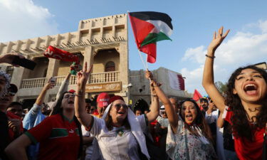 Fans of Morocco show their support ahead of the third place match against Croatia.