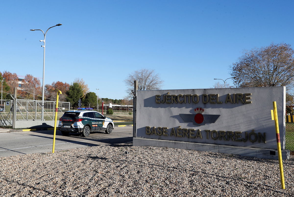 <i>Violeta Santos Moura/Reuters</i><br/>A police vehicle is seen entering the Torrejon air base near Madrid on Thursday after a suspected explosive device was found hidden in an envelope that was mailed there.