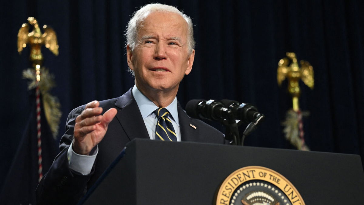 <i>Saul Loeb/AFP/Getty Images</i><br/>President Joe Biden speaks about lowering prescription drug costs and protecting Social Security and Medicare at Jones Elementary School in Joliet