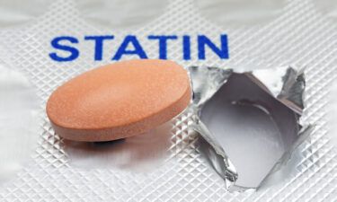 Pictured here is a close up of a generic statin tablet on a blister pack.