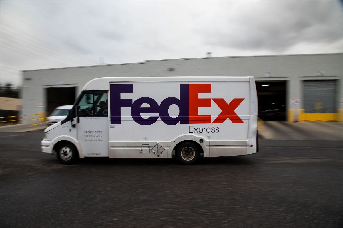 <i>Michael Nagle/Bloomberg/Getty Images/FILE</i><br/>A delivery truck leaves a FedEx Express facility on Cyber Monday in Garden City
