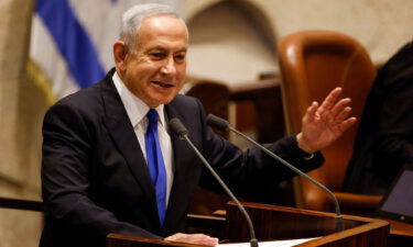 Israel's Benjamin Netanyahu presents the new government to parliament at the Knesset in Jerusalem on December 29.