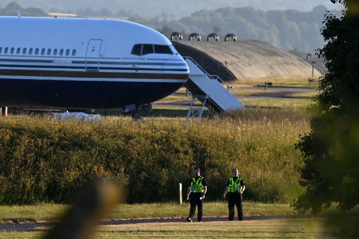 <i>Justin Tallis/AFP/Getty Images</i><br/>The first flight to Rwanda was set to take off on June 14