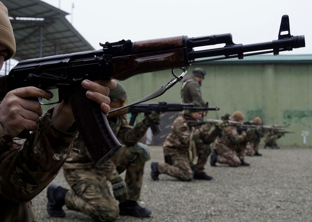 <i>AFP/Getty Images</i><br/>Volunteers and special forces troopers take part in military training at a 