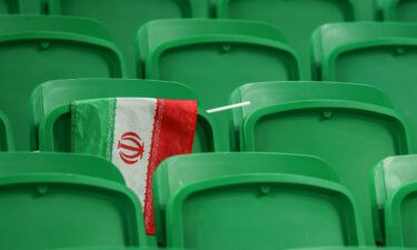 The global soccer players' union is "sickened" by reports that Iranian soccer player Amir Nasr-Azadani faces possible execution. Pictured is an Iranian flag at Al-Thumama Stadium in Doha