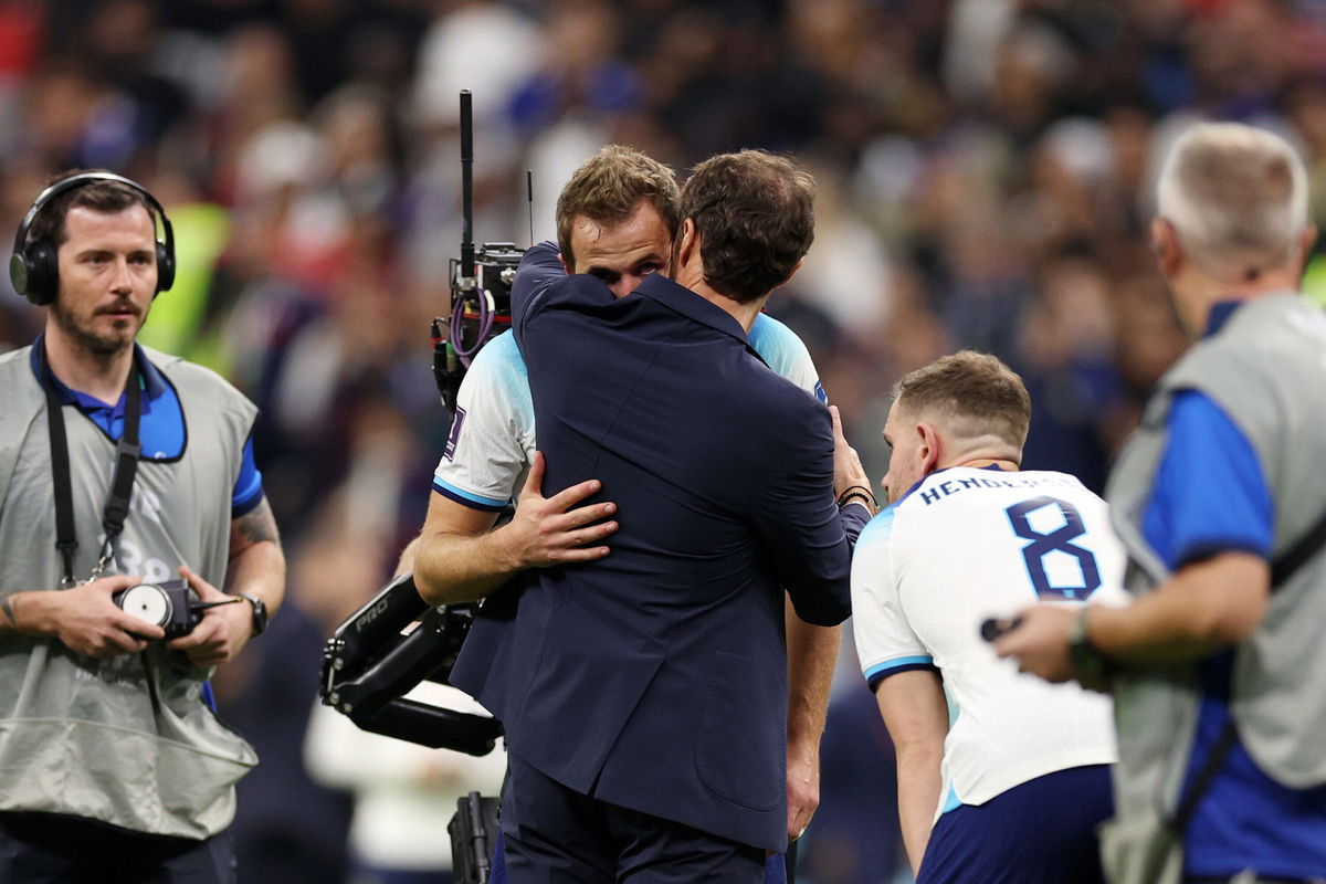 <i>Richard Heathcote/Getty Images</i><br/>Gareth Southgate consoles Harry Kane after England's defeat to France.