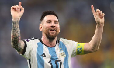 Messi celebrates Argentina's victory against Australia in the round of 16.