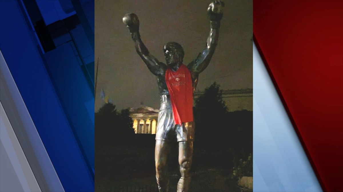 49ers fans takeover the Rocky statue in Philly 