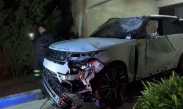 A suspected stolen vehicle being chased by officers in San Francisco's Twin Peaks area overnight Thursday rammed a police car before plunging off a hillside and landing on another vehicle.