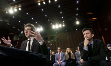 Bandmate Jordan Cohen (right) listens as singer-songwriter Clyde Lawrence (left) testifies before a Senate Judiciary Committee hearing on January 24 to examine promoting competition and protecting consumers in live entertainment.