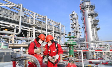 Global oil demand could hit its highest-ever level this year as China reopens. Pictured is an oil and gas field in China's Aksu Prefecture on January 4.