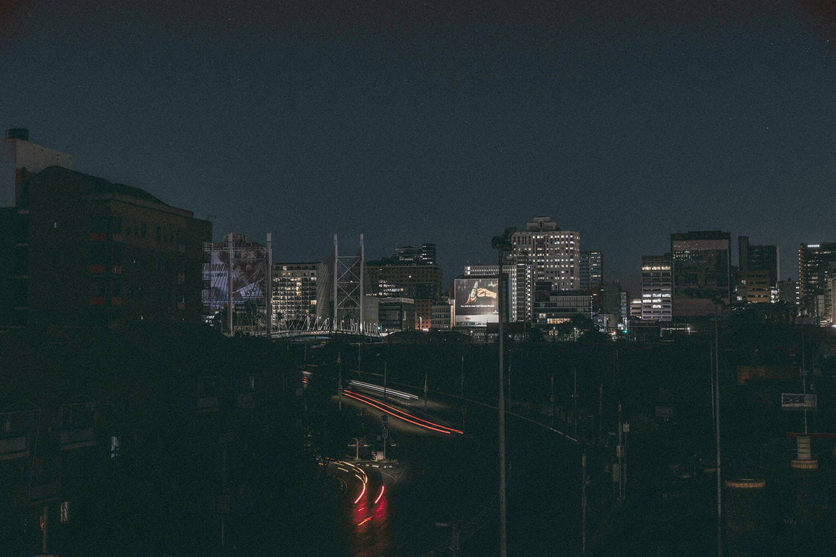 <i>Marco Longari/AFP/Getty Images</i><br/>The darkened Braamfontein district in central Johannesburg during a load shed on January 15.