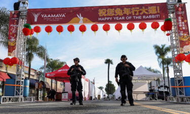 Police officers guard the area near the location of a shooting that took place in Monterey Park.