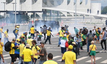 Supporters of former Brazilian President Jair Bolsonaro clash with police during a demonstration outside the Planalto Palace in Brasília on Sunday.