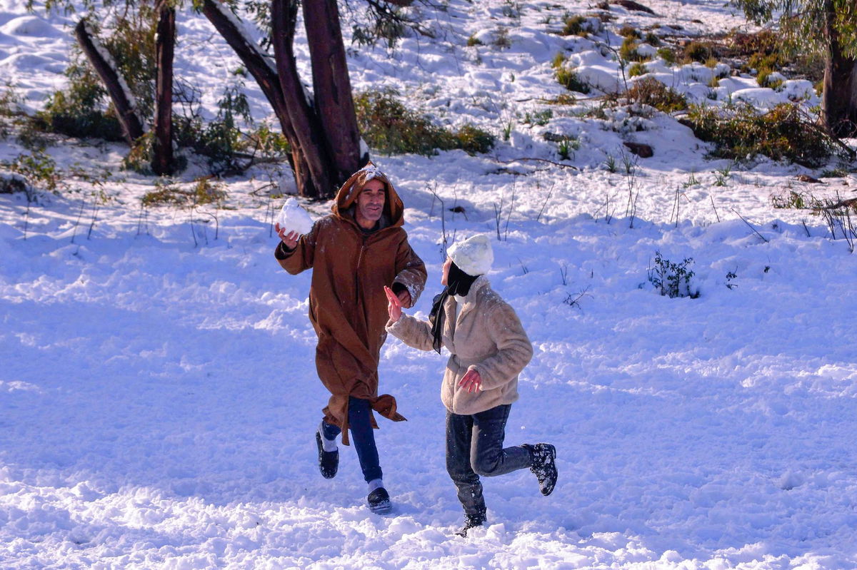 <i>Stringer/AFP/Getty Images</i><br/>People play in the snow in Algeria's Constantine province