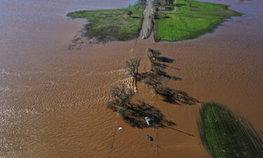 Three vehicles are submerged on Dillard Road west of Highway 99 in south Sacramento County in Wilton