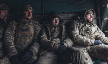 Ukrainian soldiers work in their artillery unit in January.