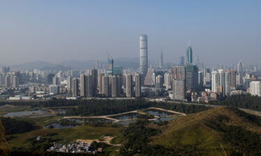 Skyscrapers in Shenzhen are viewed from the border in Hong Kong on December 14