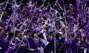 The Department of Education is proposing lower payments for millions of student loan borrowers. Pictured is a graduation ceremony for New York University students at Yankee Stadium