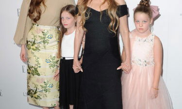 Riley Keough and Lisa Marie Presley along with twins Harper and Finley Lockwood in 2017.