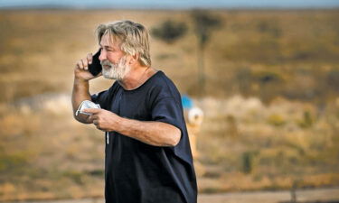 A distraught Alec Baldwin lingers in the parking lot outside the Santa Fe County Sheriff's offices on Camino Justicia after being questioned on October 20