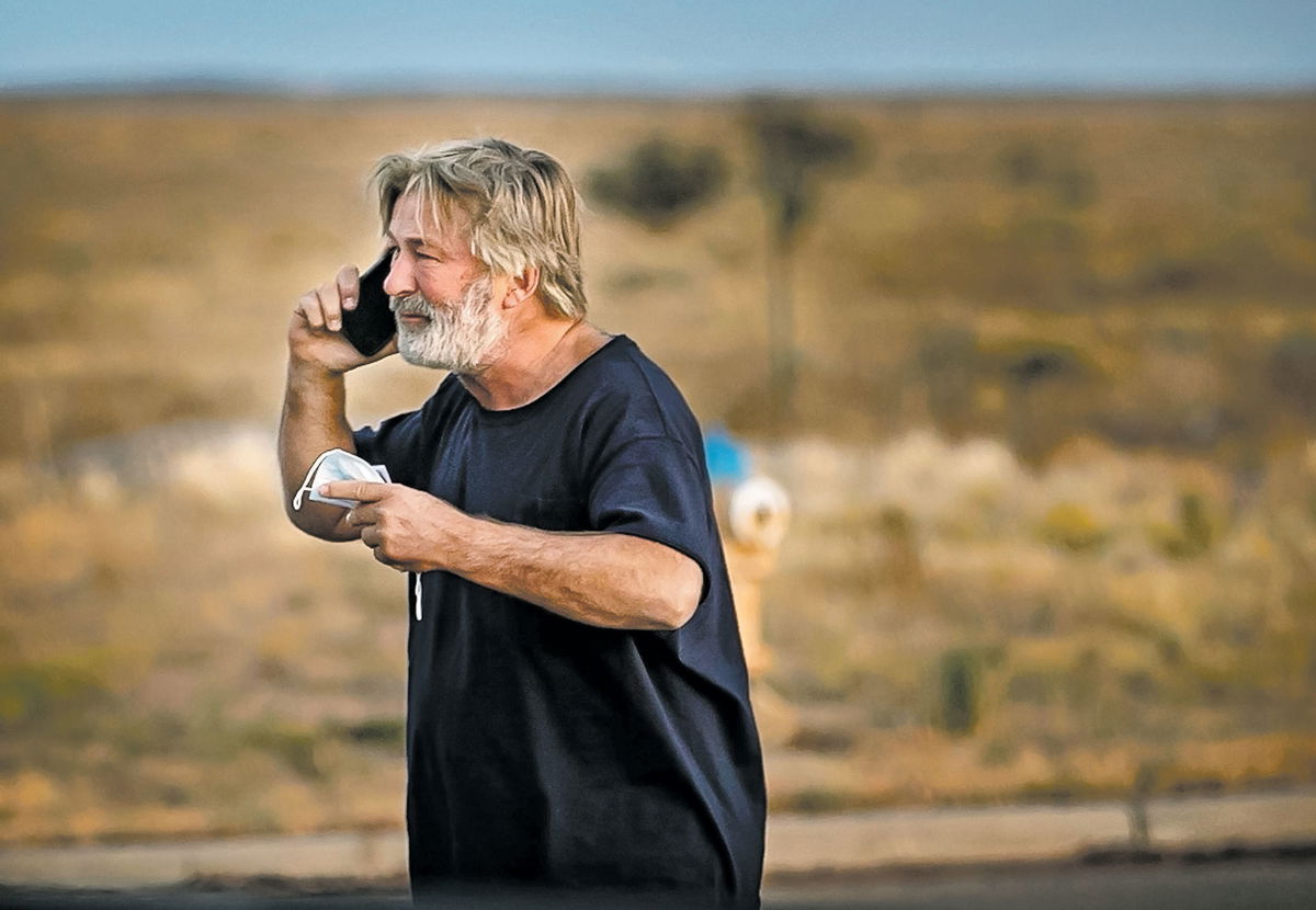 <i>Jim Weber/Santa Fe New Mexican</i><br/>A distraught Alec Baldwin lingers in the parking lot outside the Santa Fe County Sheriff's offices on Camino Justicia after being questioned on October 20