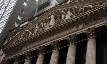 Trading for dozens of companies on the New York Stock Exchange was briefly halted Tuesday just after the market opened.