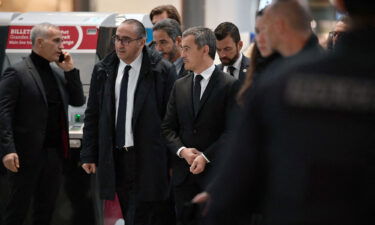 French Interior Minister Gerald Darmanin (third left) and Paris Police Prefect Laurent Nunez (second left) arrive at Gare du Nord