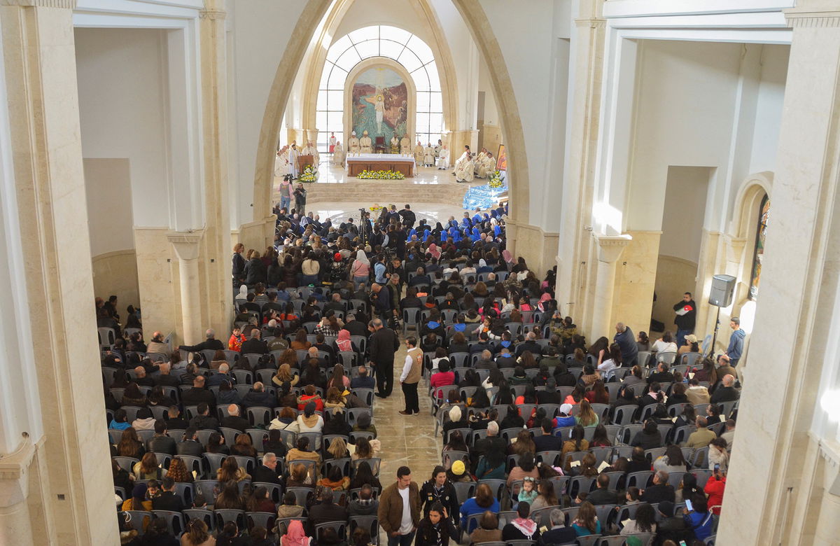 <i>Muath Freij/Reuters</i><br/>Worshipers attend a mass inside the Church of the Baptism of Lord Jesus Christ in Jordan Valley