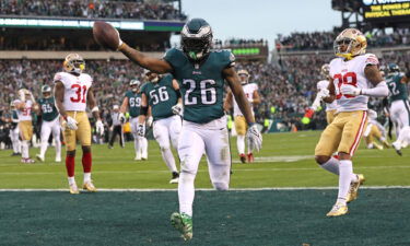 Miles Sanders scores a touchdown against the San Francisco 49ers during the NFC Championship game at Lincoln Financial Field.