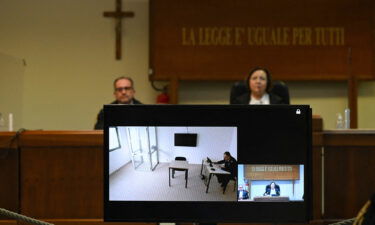 A television screen in a special bunker court in Caltanissetta