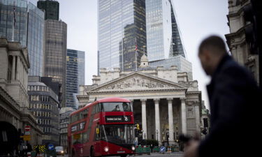 A person crosses the street outside the Bank of England in London on January 23.