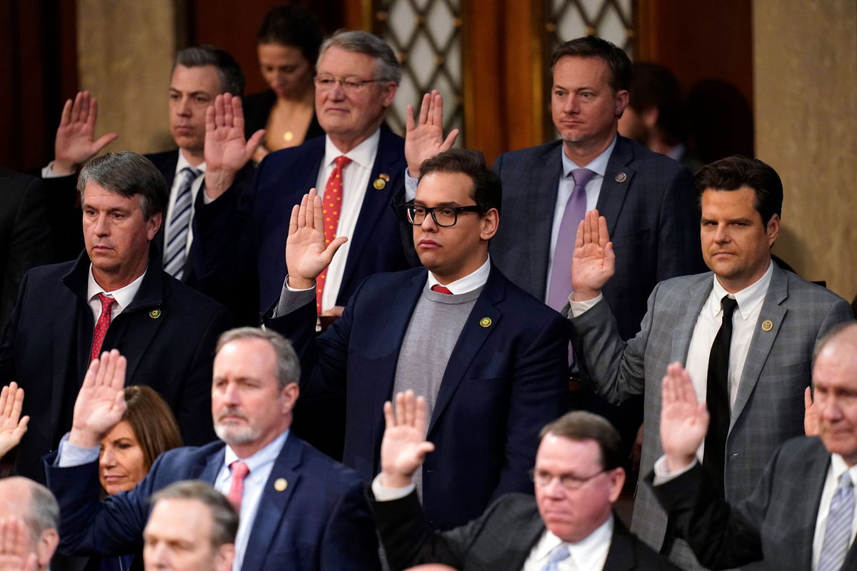 <i>Alex Brandon/AP</i><br/>A campaign watchdog group wants to investigate New York Rep. George Santos' campaign finances. Santo is here sworn in by Speaker of the House Kevin McCarthy early Saturday