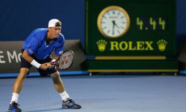 Lleyton Hewitt waits for Marcos Baghdatis' serve at 4:30 a.m. at the 2008 Australian Open.