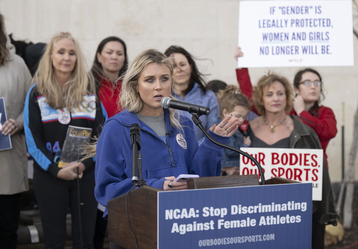 <i>Darren Abate/AP</i><br/>Riley Gaines speaks at a rally outside the NCAA Convention in San Antonio