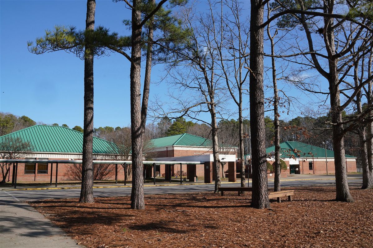 <i>Jay Paul/Getty Images</i><br/>Tall pine trees are pictured outside Richneck Elementary School on January 7 in Newport News
