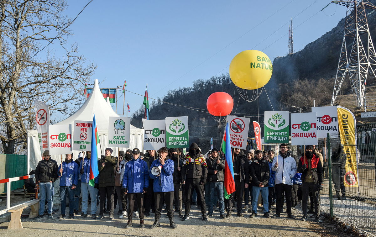 <i>Tofik Babayev/AFP/Getty Images</i><br/>Azerbaijani demonstrators stage a protest