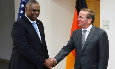 Newly appointed German Defense Minister Boris Pistorius (right) and United States Secretary of Defense Lloyd J. Austin III shake hands prior to a statement at the defense ministry in Berlin