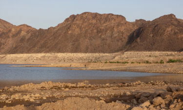 The sun sets on the shrinking Lake Mead in April of 2022