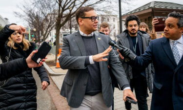 New York Rep. George Santos leaves a House GOP Conference meeting on Capitol Hill in Washington