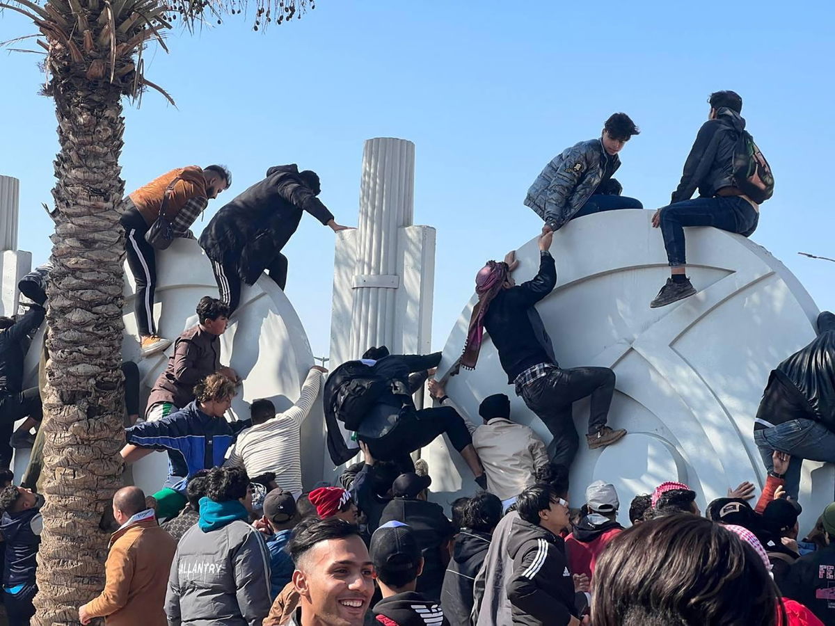 <i>Mohammed Aty/Reuters</i><br/>Soccer fans attempt to enter the Basra International Stadium to watch the final match of the 25th Arabian Gulf Cup between Iraq and Oman