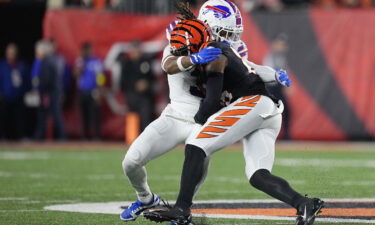 Hamlin tackles Tee Higgins of the Cincinnati Bengals during Monday's game.