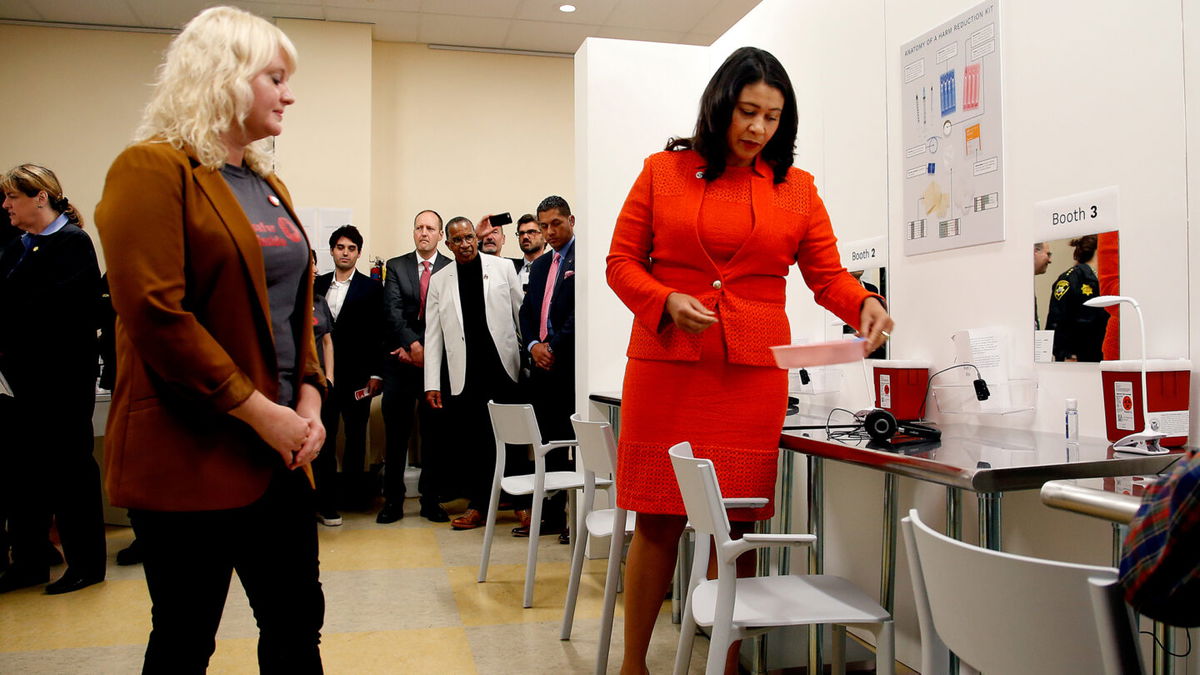 <i>Karl Mondon/The Mercury News/Getty Images</i><br/>San Francisco Mayor London Breed (right) tours Safer Inside