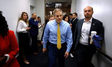 Rep. Jim Jordan (center) heads for a Republican caucus meeting before the start of the 118th Congress in the basement of the US Capitol Building on January 3.