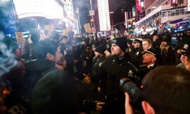 Police officers and protesters clash in New York on January 27.