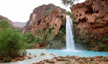 Havasu Falls spills into the water pools below in Supai