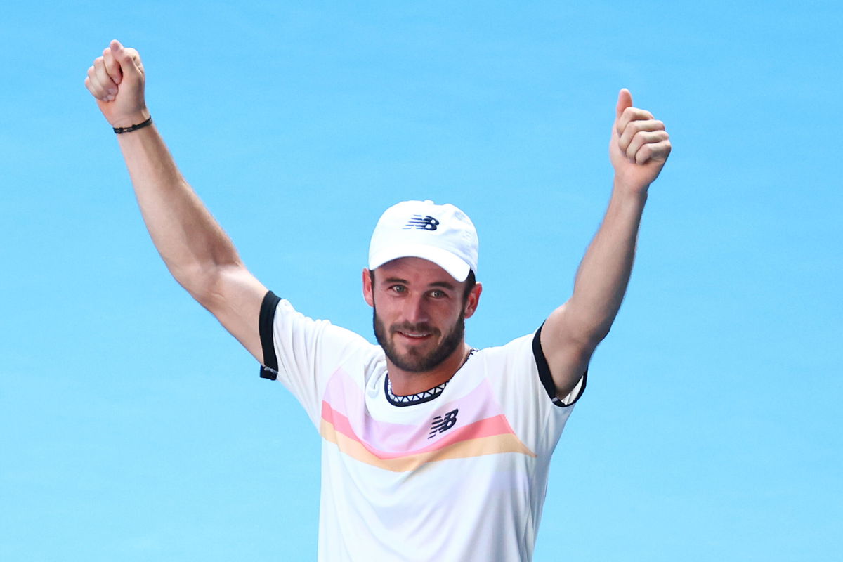 <i>Graham Denholm/Getty Images AsiaPac/Getty Images</i><br/>Tommy Paul celebrates after winning match point against Ben Shelton.