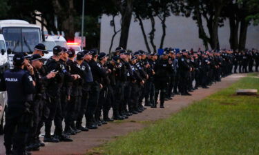 Police line up in Brasilia on January 11.